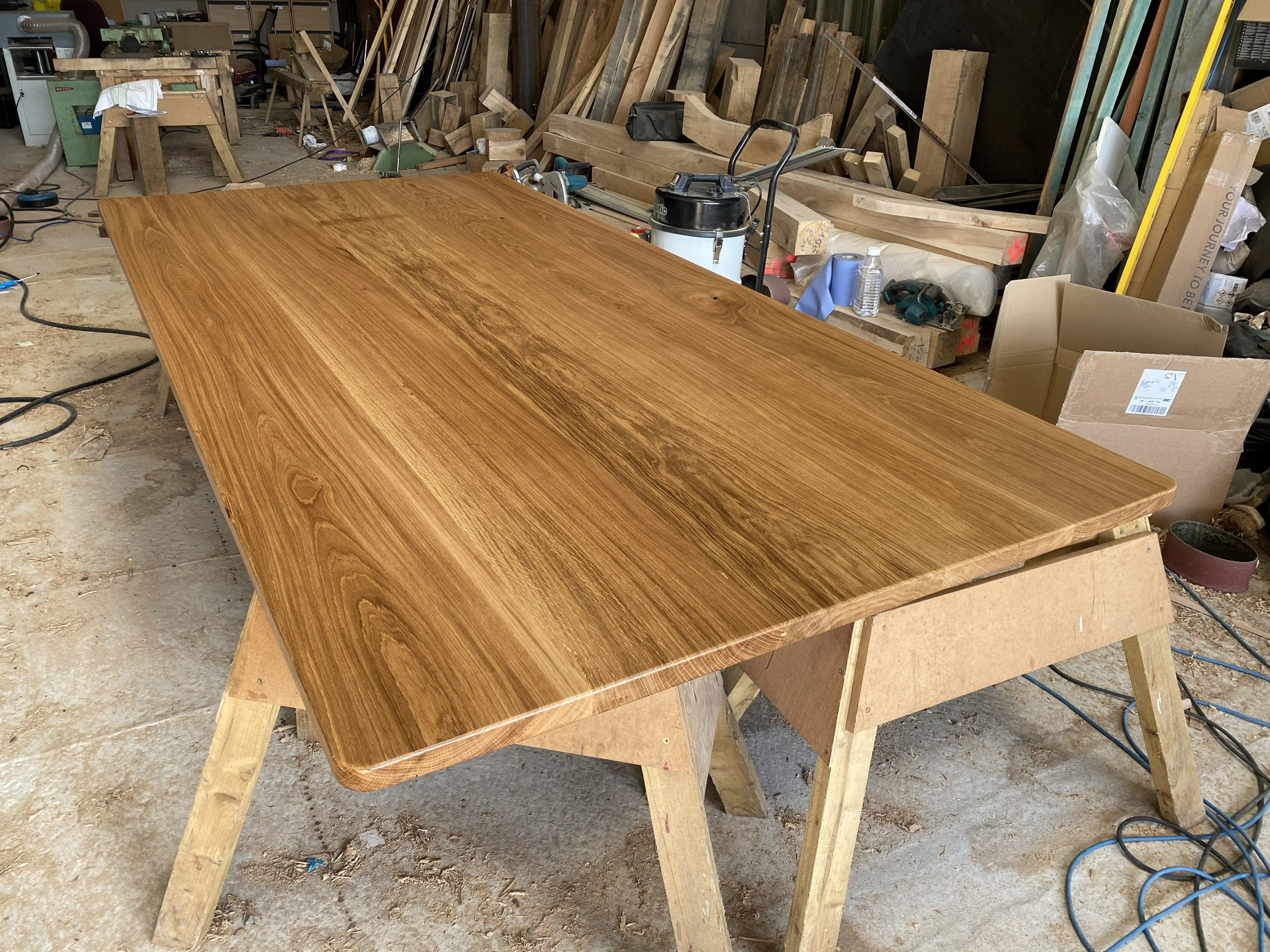 Bespoke solid oak boardroom table for corporate office fit-out